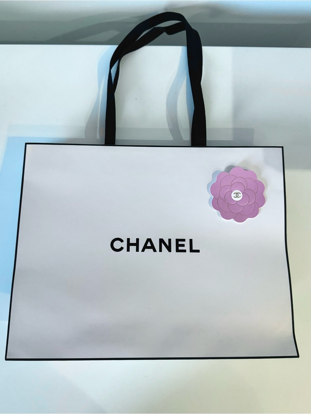 Chanel Beauty White & Black Paper Shopping Bag With Pink Camelia Sticker